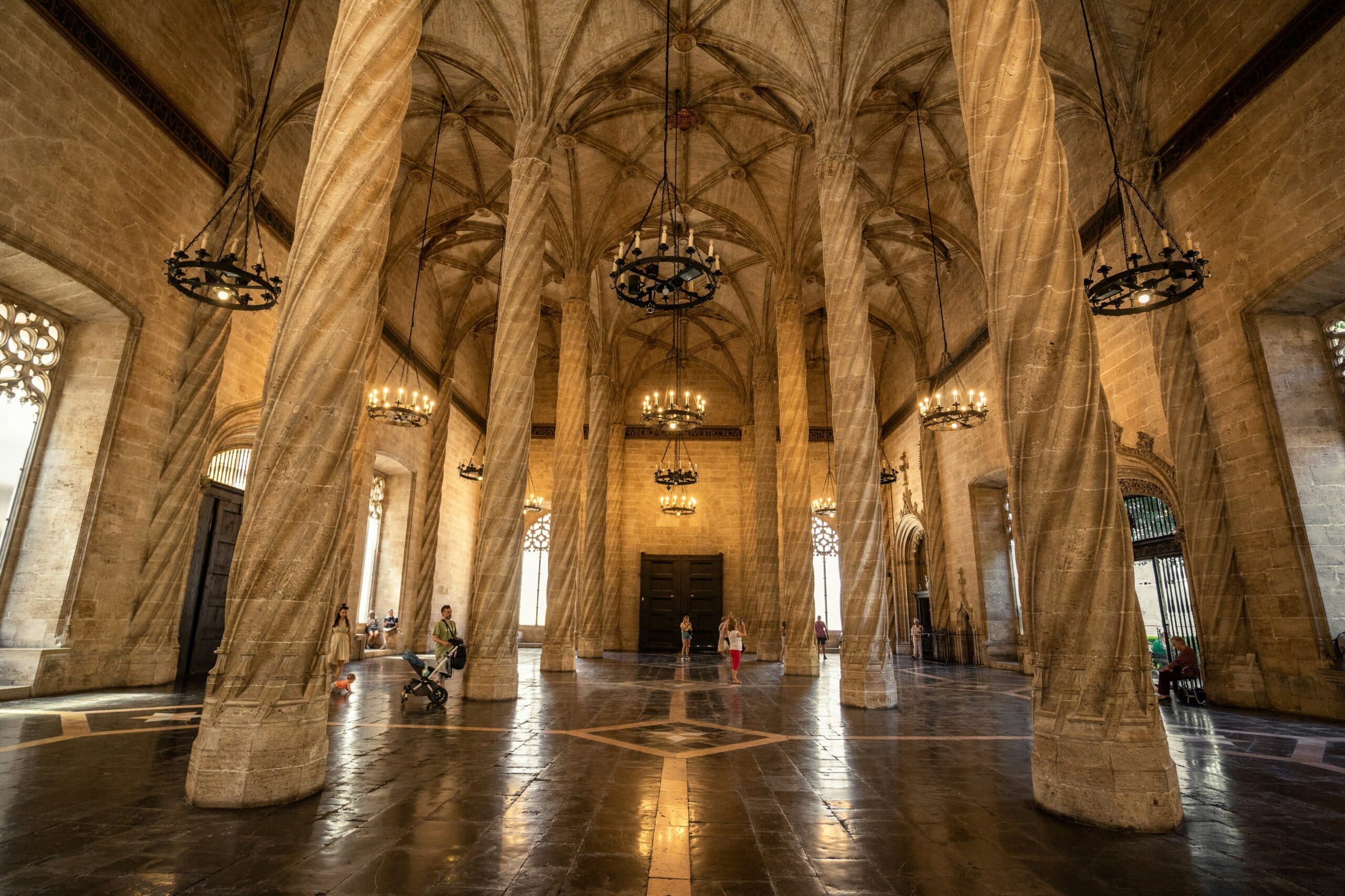 inside la lonja de la seda, a great hall with detailed pillars, one of valencia's facts